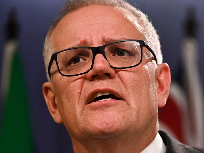 (FILES) Australia's former prime minister Scott Morrison speaks to media during a press conference in Sydney on August 17, 2022. (Photo by Steven Saphore / AFP)