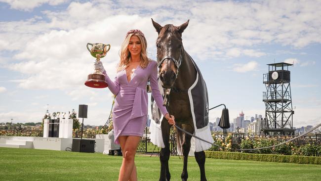 Melbourne Cup Carnival Ambassador Nadia Bartel poses with Brew who won the 2000 Melbourne Cup during the Melbourne Cup Carnival Launch at Flemington Racecourse on October 27, 2020 in Flemington, Australia. (Scott Barbour/Racing Photos via Getty Images)