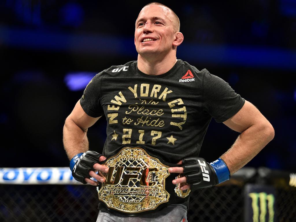 Georges St-Pierre won titles in two weight classes. Picture: Jeff Bottari/Zuffa LLC/Zuffa LLC via Getty Images)