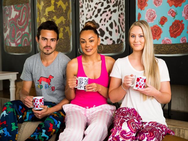 Singer Prinnie Stevens, flanked by models, wears the rock star label of pyjamas, Peter Alexander, which is also owned by Premier Investments.