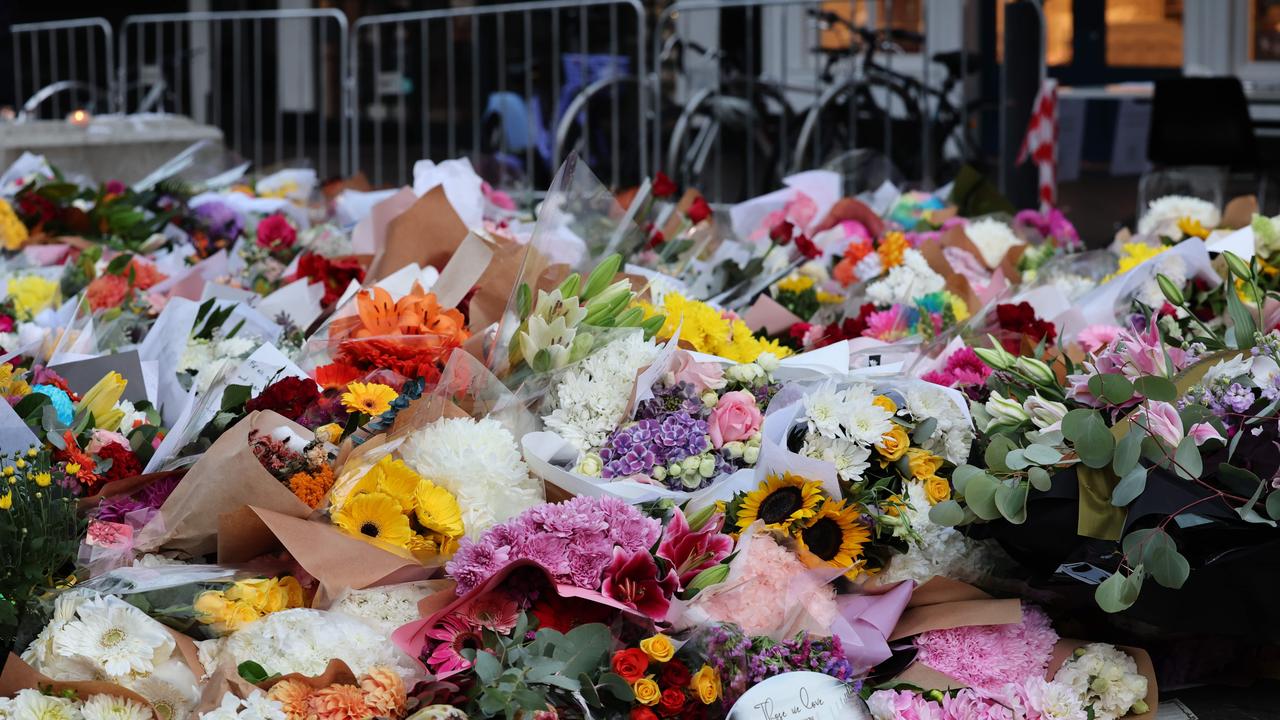 Flower ntributes seen Bondi Junction after the incident. Picture: NCA NewsWire / Rohan Kelly