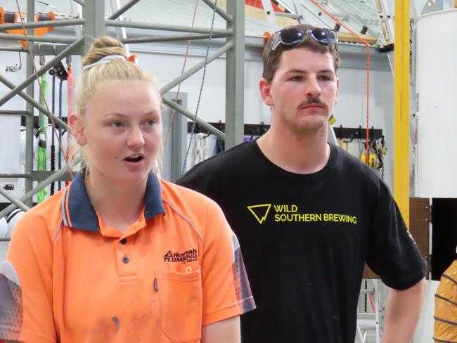 Carpenter Daniel Richardson and apprentice plumber Halle Whitehead speak to the media at Cambridge on Wednesday, December 18, 2024.