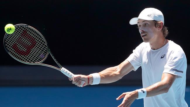 Alex de Minaur during a practice session on Saturday. Picture: Kelly Defina/Getty Images