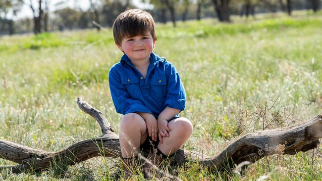 Memphis Francis, 3, is stuck in NSW at his grandparents property near Griffith after Queensland closed its border. Picture: Ginette Guidolin