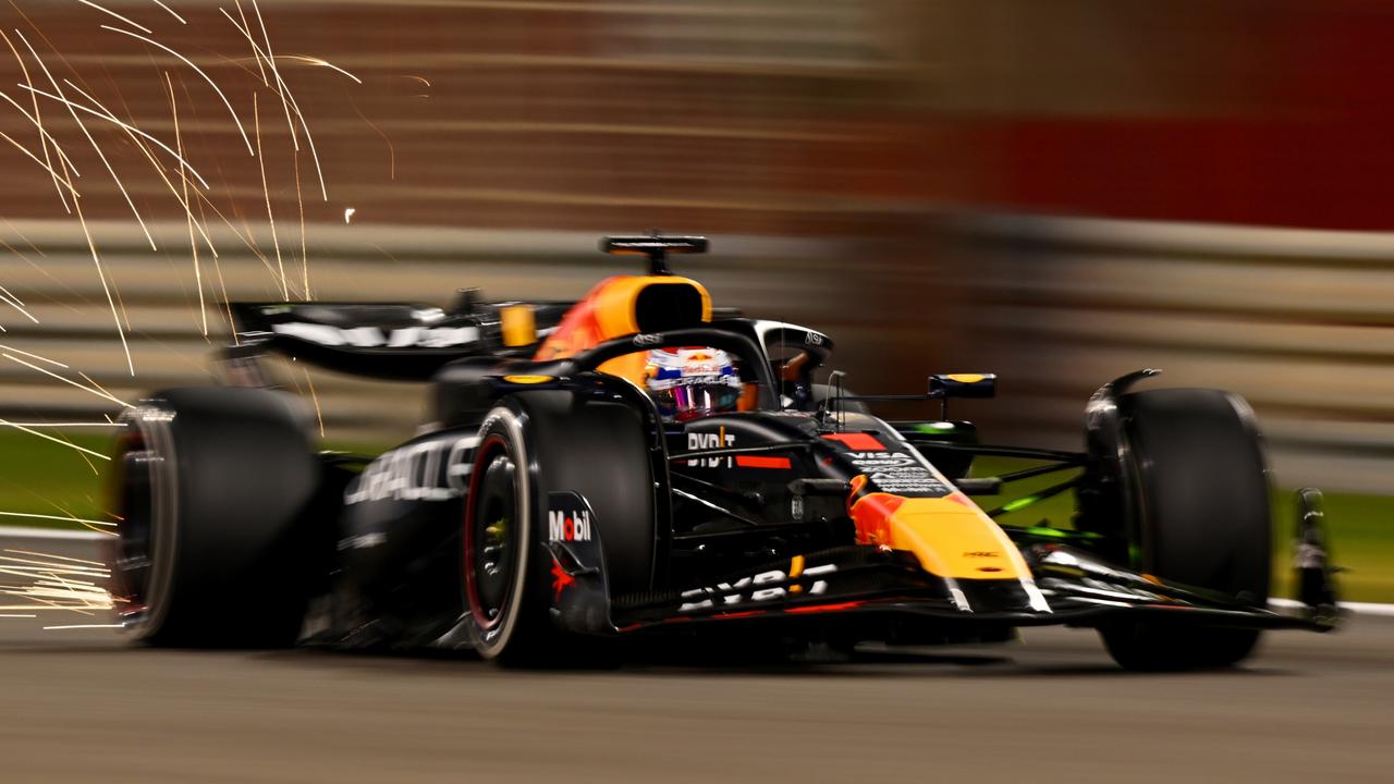 BAHRAIN, BAHRAIN - FEBRUARY 23: Sparks fly behind Max Verstappen of the Netherlands driving the (1) Oracle Red Bull Racing RB20 during day three of F1 Testing at Bahrain International Circuit on February 23, 2024 in Bahrain, Bahrain. (Photo by Clive Mason/Getty Images)