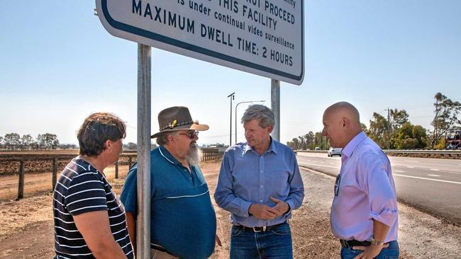 FLAWED: Shadow minister for transport Steve Minnikin (right) meets with member for Lockyer Jim McDonald and Regency Downs Truck driver Terry Dingle and his wife at the Gatton Truck Break Down area. Mr McDonald is calling for a complete redesign of the rest area. Picture: DOMINIC ELSOME