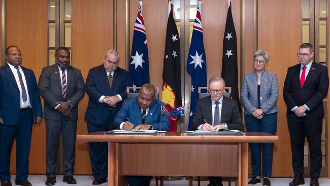 Prime Minister Anthony Albanese participates in an official signing ceremony with Papua New Guinea’s Prime Minister James Marape in Canberra.