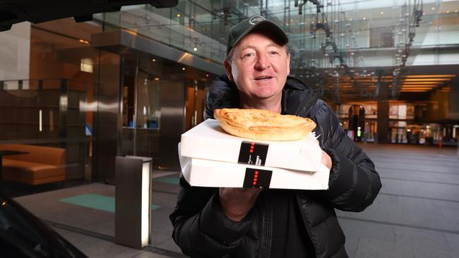 Chef Luke Mangan, along with a limited number of staff, are cooking and hand delivering up to 400 pies a day. Picture: Richard Dobson