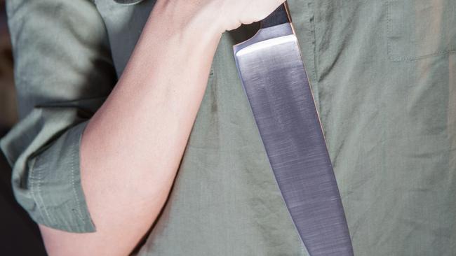 A man has been fined for using a hunting knife in a laundromat.