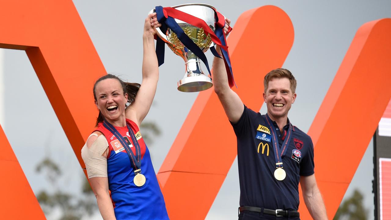 Daisy Pearce enjoyed the perfect end to her career, pictured with Melbourne coach Mick Stinear after winning the club’s first AFLW flag against Brisbane at Brighton Homes Arena in November. Picture: Getty Images