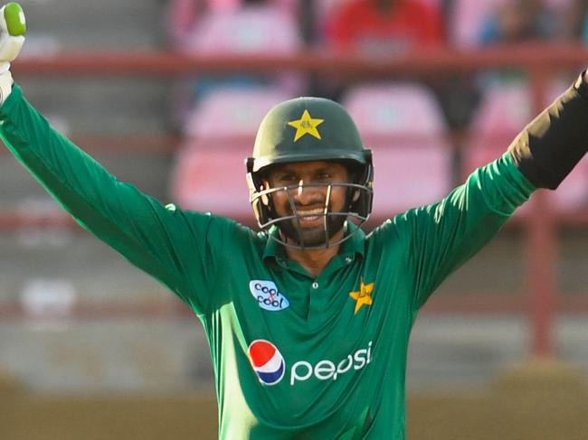 Shoaib Malik of Pakistan celebrates winning the the 3rd and final ODI match between West Indies and Pakistan at Guyana National Stadium, Providence, Guyana, April 11, 2017.  / AFP PHOTO / Randy BROOKS