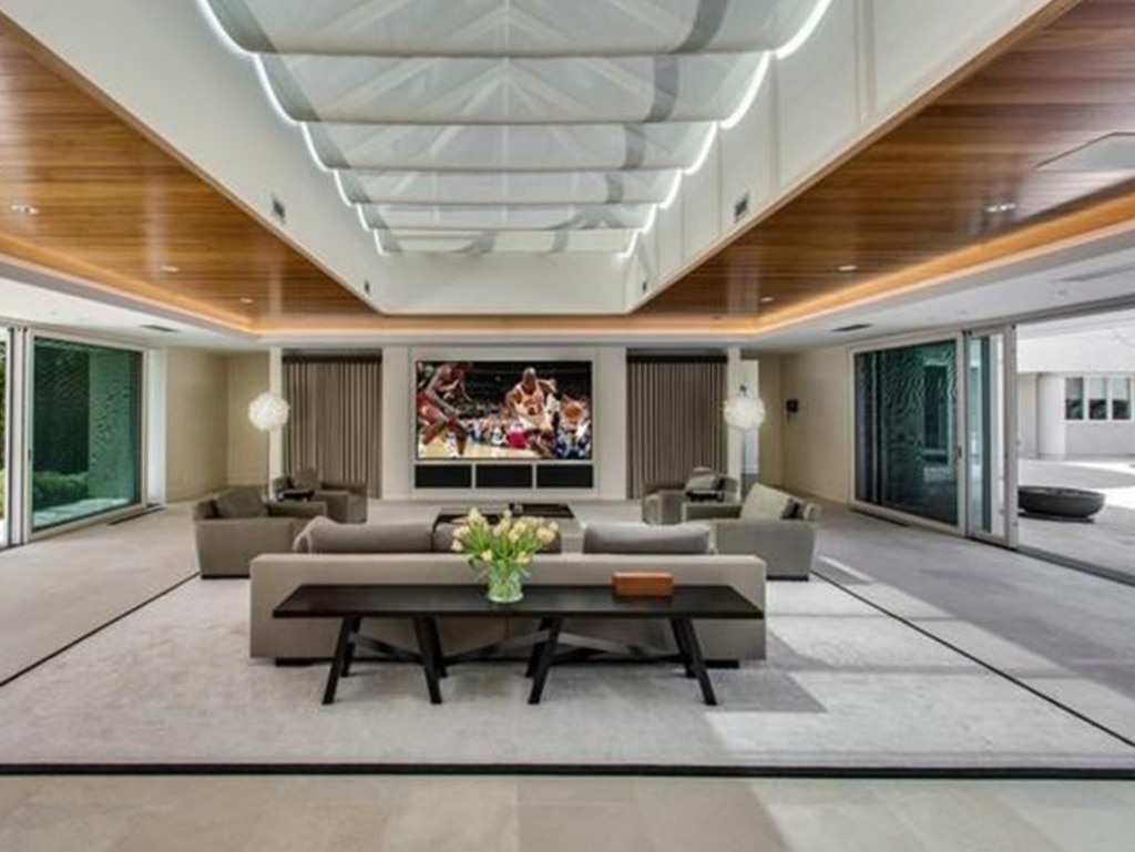 An open-floor living room with slide doors. Picture: realtor.com