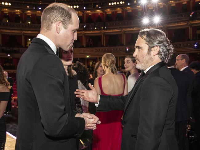 LONDON, ENGLAND - FEBRUARY 02: Prince William, Duke of Cambridge speaks with BAFTA winner Joaquin Phoenix at the EE British Academy Film Awards 2020 at Royal Albert Hall on February 2, 2020 in London, England. (Photo by Jeff Gilbert - WPA Pool / Getty Images)