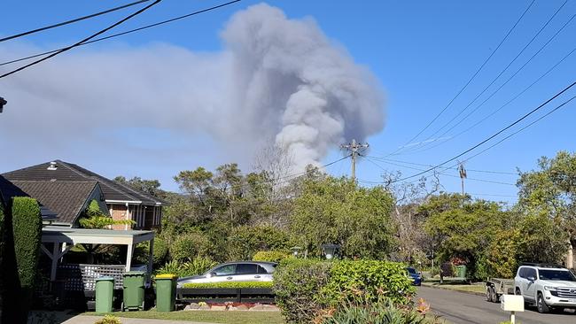 The view of the fire at Oxford Falls from a neighbourhood located more than 5km away. Picture: David Tanner