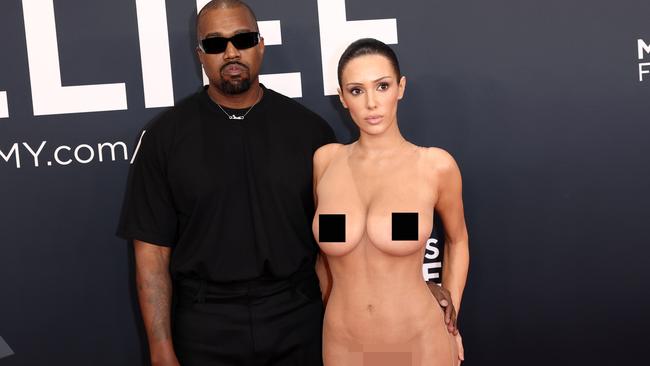 LOS ANGELES, CALIFORNIA - FEBRUARY 02: (EDITOR'S NOTE: Image contains nudity.) L-R, Kanye West and Bianca Censori attend the 67th Annual GRAMMY Awards on February 02, 2025 in Los Angeles, California.  (Photo by Matt Winkelmeyer/Getty Images for The Recording Academy)