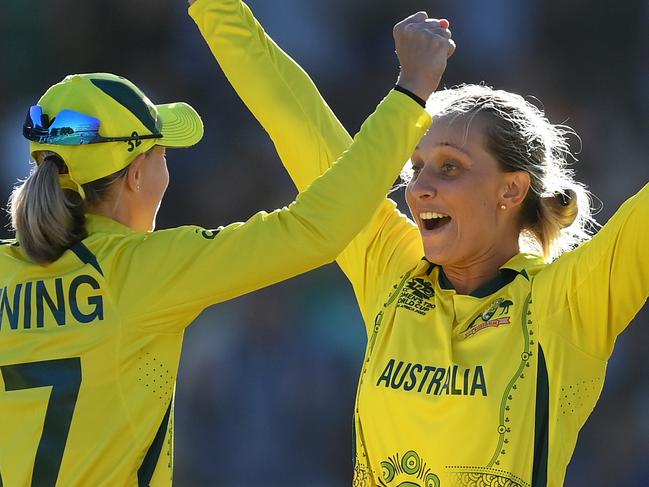 CAPE TOWN, SOUTH AFRICA - FEBRUARY 26: Meg Lanning and Ashleigh Gardner of Australia celebrates after winning the ICC Women's T20 World Cup following the ICC Women's T20 World Cup Final match between Australia and South Africa at Newlands Stadium on February 26, 2023 in Cape Town, South Africa. (Photo by Mike Hewitt/Getty Images)