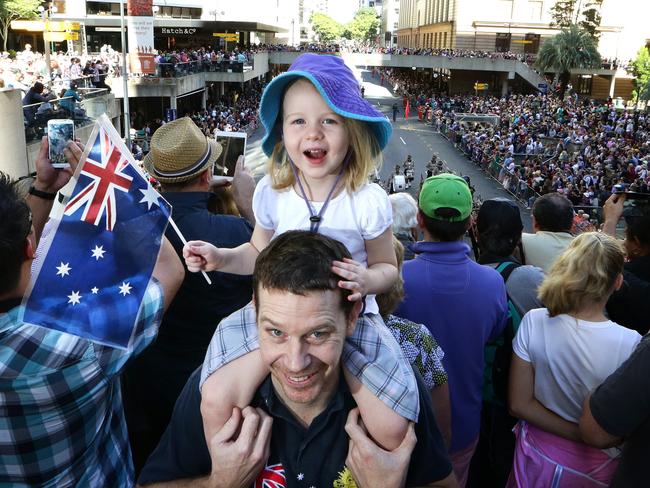 Holly Payne, 3, and Simon Payne at the Brisbane Anzac Day march Picture: Liam Kidston