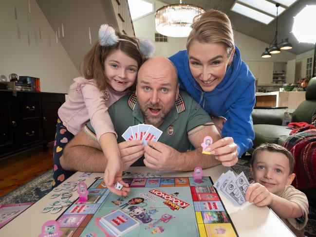 Isabel Coltman, 6, Dane Coltman, 43, Anastasia Manousakis, 34 and Anthony Coltman, 4, have a collection of many toys from their parents’ childhoods. Picture: Tony Gough