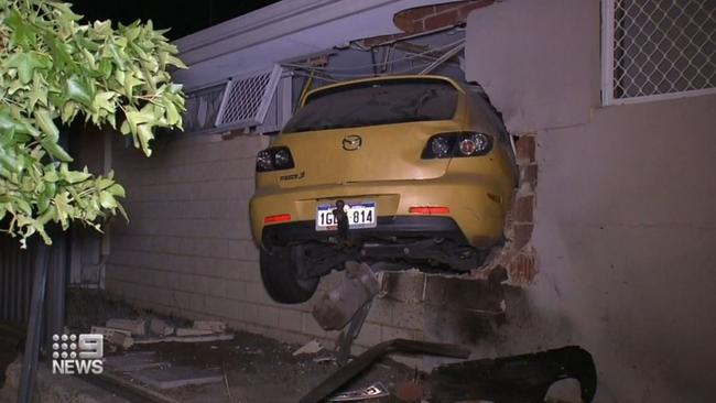 A car crashed into the wall of an Aveley house narrowly missing a sleeping father. Picture: 9 News