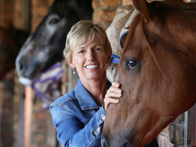 Racehorse trainer Gillian Heinrich believes she has beaten cancer. She said it was "like winning Lotto". Giliian welcomed back to her stables at Bundall by a couple of two year olds. Picture Glenn Hampson