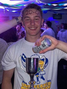 Golden Grove's Aidan Thatcher celebrates his club's 20-0 achievement in division three. Picture: Golden Grove Football Club