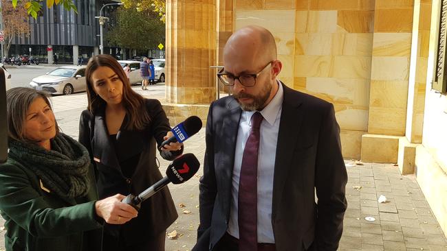 Dr Tom Entwisle outside the Adelaide Magistrates Court, where he pleaded guilty to drunk-driving a Womad cart down King William St. Picture: Sean Fewster