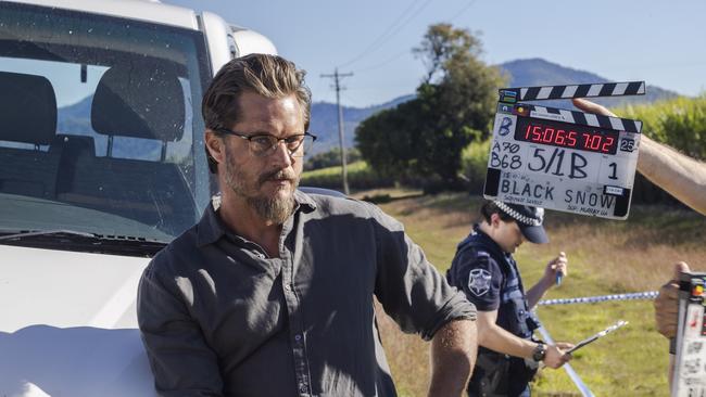 behind-the-scenes photos from the Stan original Black Snow. Travis Fimmel (Cormack)