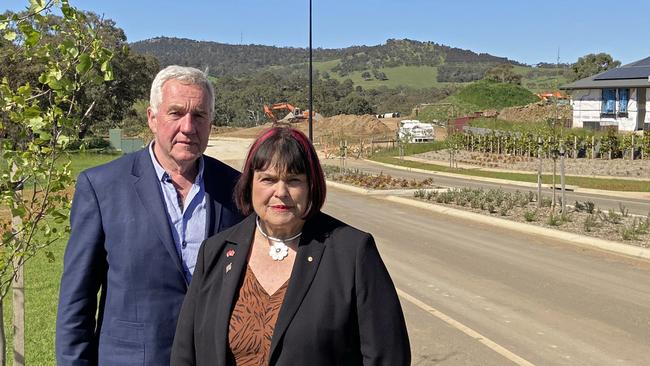 Mount Barker District Council chief executive Andrew Stuart and Mayor Ann Ferguson on a segment of the Heysen Boulevard that currently goes nowhere. Picture: Andrew Rammel