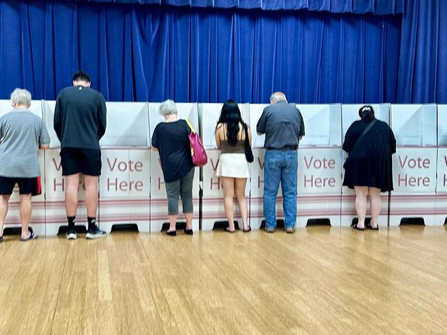 Pre-Polls - Generic polling booth picture. People voting (Southport Community Centre).NO BYLINE