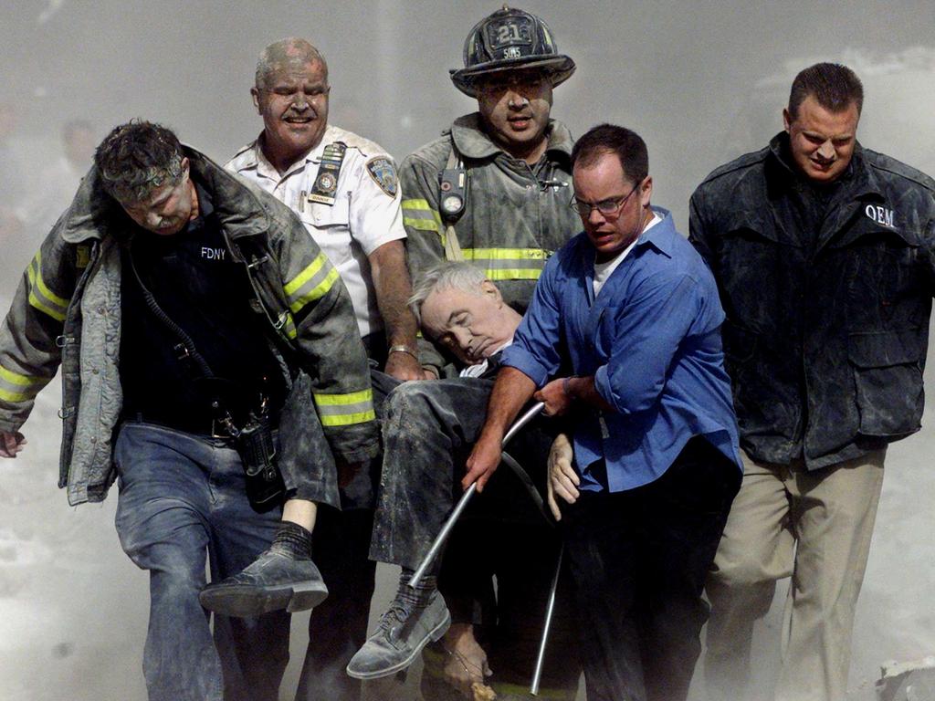 Father Mychal Judge being carried from the rubble of the World Trade Center. Picture: Shannon Stapleton/AJ Pics/Alamy