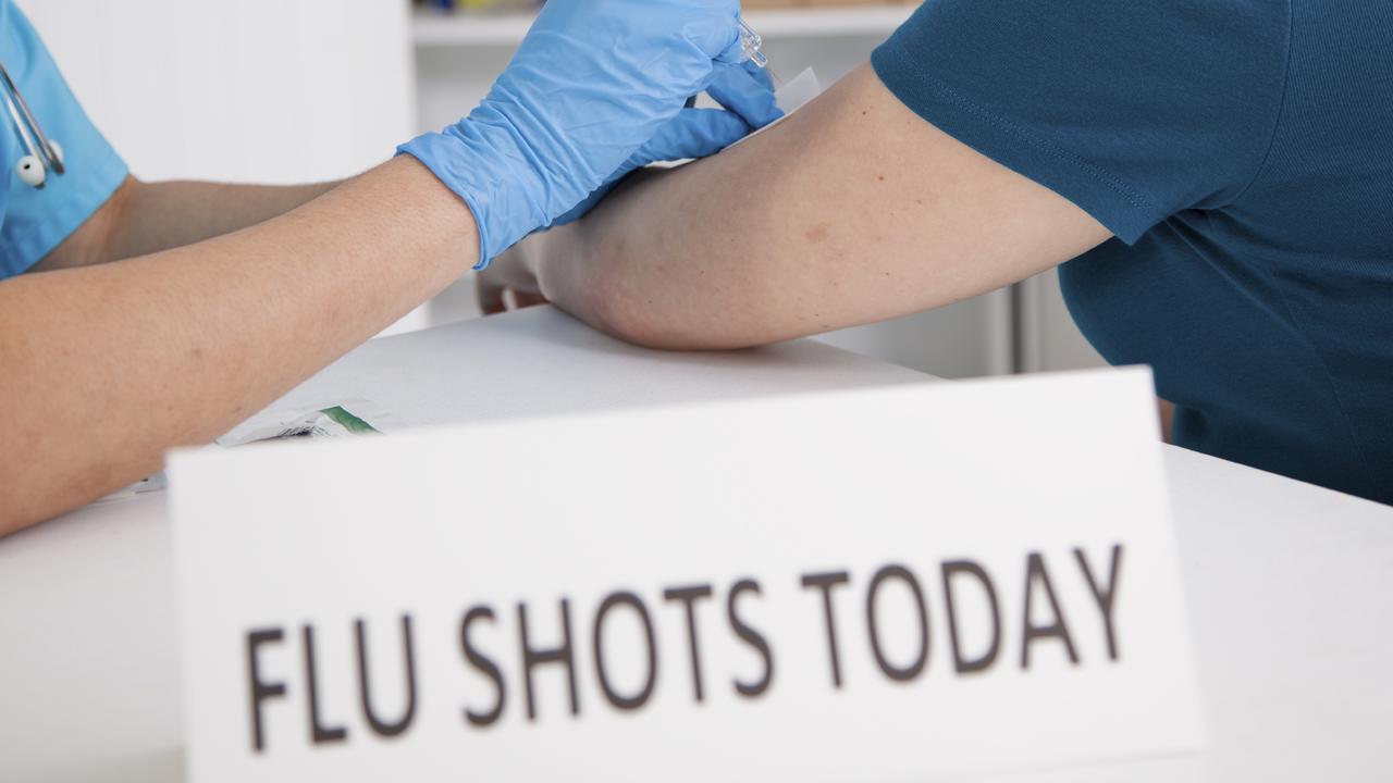Flu vaccine take-up rates are low in Queensland.