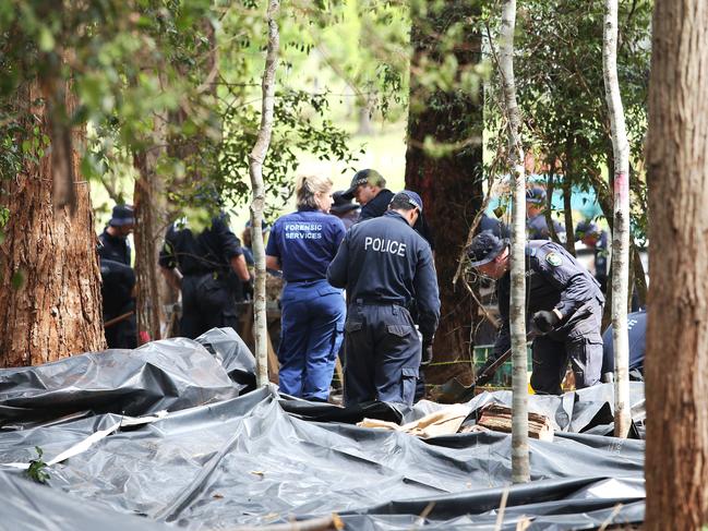 Officers search near Kendall less than 1km from where William was last seen. Picture Peter Lorimer