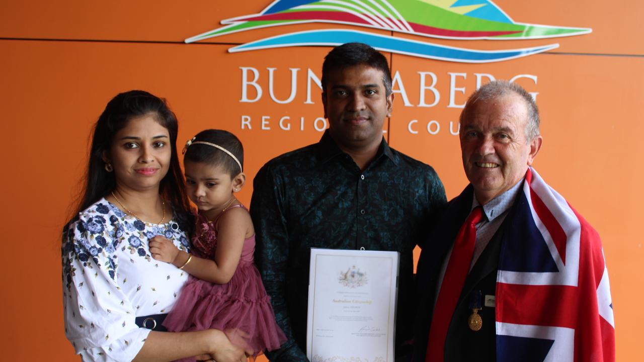 Councillor Vince Habermann (right, with new citizen Johny George and family) bemoaned the politicisation of the rescheduling of the Australia Day citizenship ceremony.