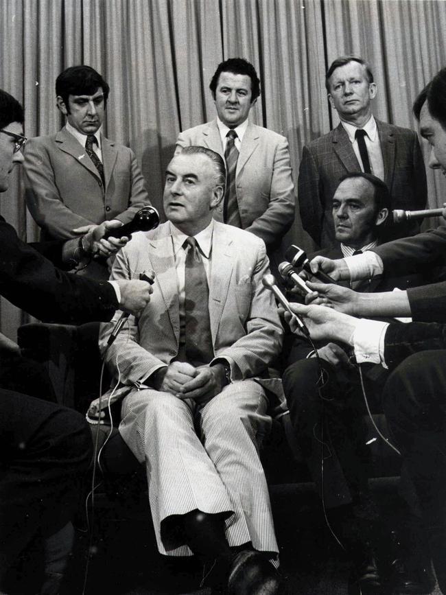 Whitlam is quizzed by the media at the airport before the mission's departure to China.