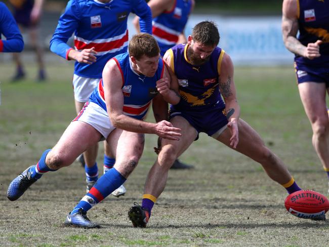 Josh Allison competes for the ball against Darcy Crocker during the 2017 finals series. Picture: Hamish Blair