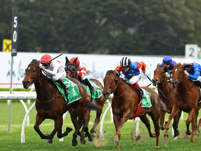 Bella Nipotina (black and white striped cap) chases home I Am Me in the Concorde Stakes at Randwick on Saturday. Photo: Jeremy Ng/Getty Images.