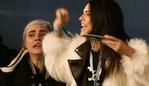 Kendall Jenner (right) and Cara Delevingne watching Kanye West performing on The Pyramid Stage at the Glastonbury Festival, at Worthy Farm in Somerset.. Picture date: Saturday June 27, 2015. Photo credit should read: Yui Mok/PA Wire