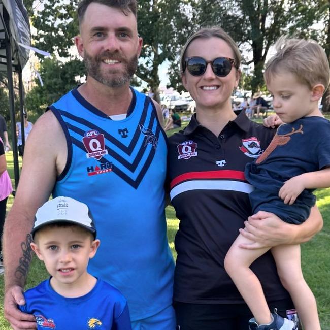 Wade Williams, his wife Britt, and his two children after making his return to the football field after battling a brain tumour.