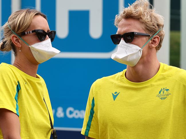 BIRMINGHAM.  23/07/2022 . Commonwealth Games.  Australian swim team arrive at Birmingham Airport.  Cody Simpson and  Emma McKeon after arriving in Birmingham today  . Photo by Michael Klein