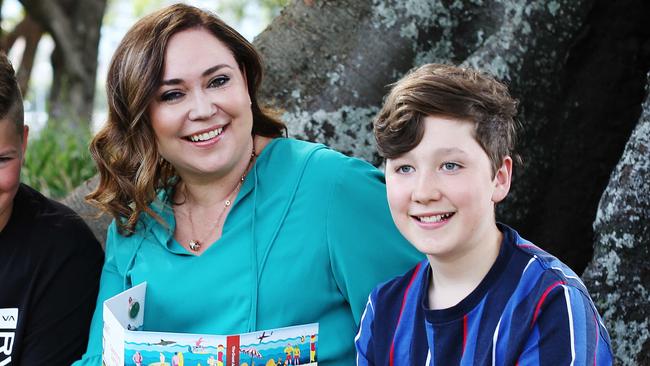 Australia Post’s Nicole Sheffield, pictured with son Max, says it’s wise to send stuff early. Picture: Nikki Short