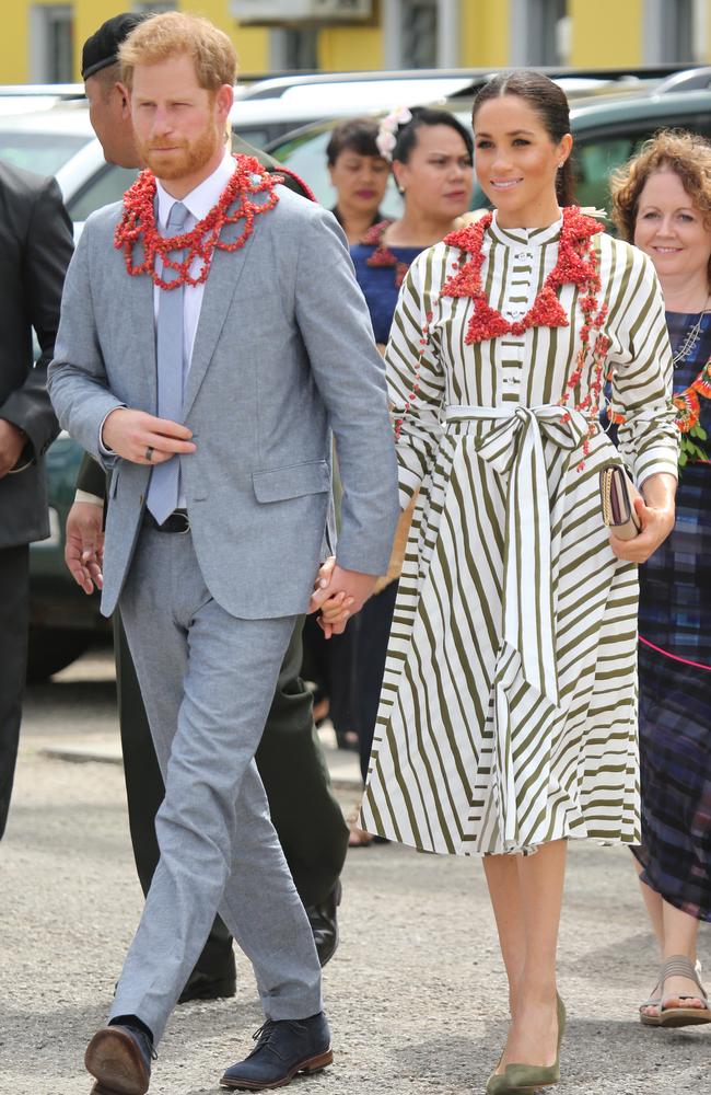 Harry and Meghan, wearing Martin Grant. Picture: Nathan Edwards