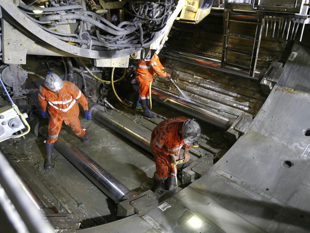 Workmen underground laying Ring 636 in the North West Rail Link tunnel. The North West Rail Link is underway and TBM Elizabeth has cut through 1092metres of earth travelling East from Bella Vista. Picture: Bradley Hunter