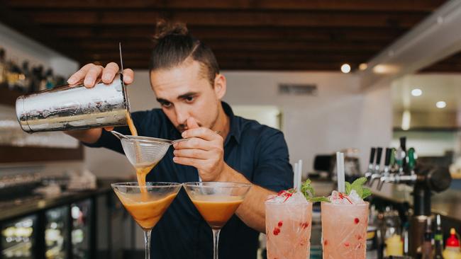 8th Ave Terrace Restaurant man making cocktail drink, Palm Beach, Queensland. Picture: Supplied/Destination Gold Coast