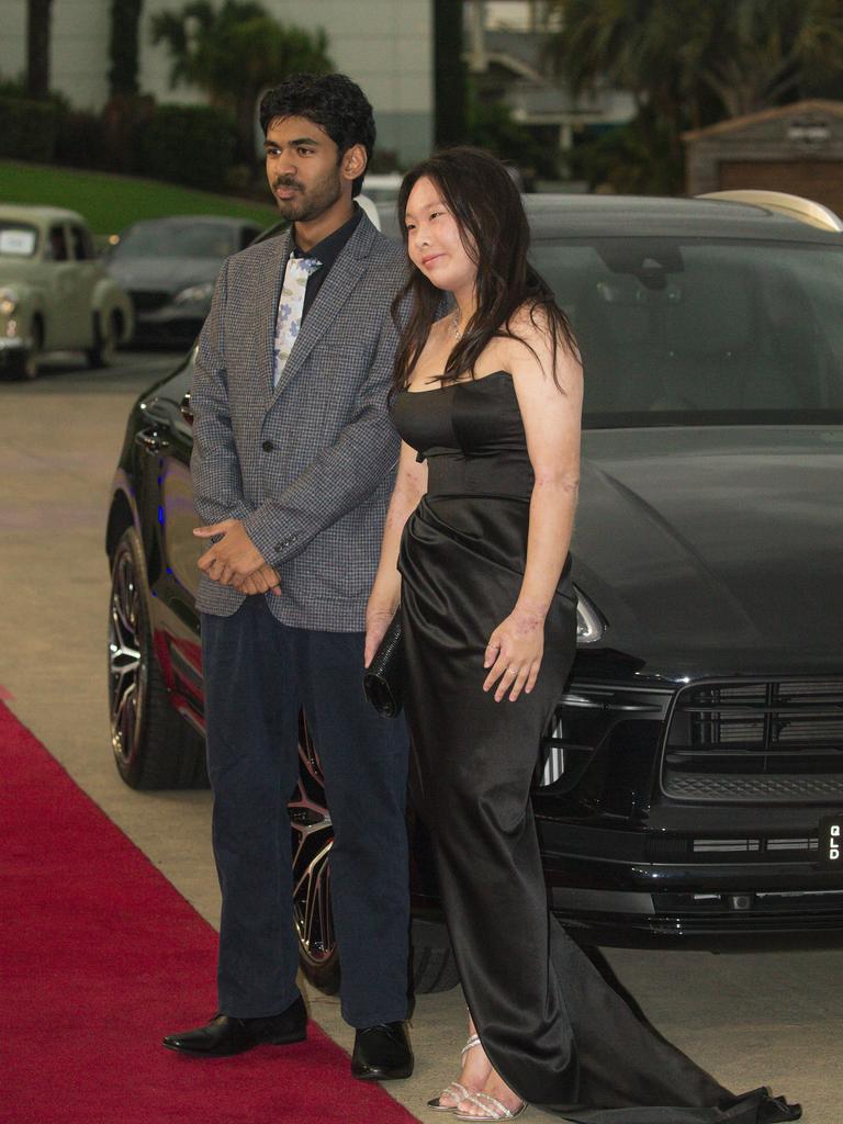 Grace Gao and partner Rafid among arrivals at the Southport State High school formal held at Sea World. Picture: Glenn Campbell