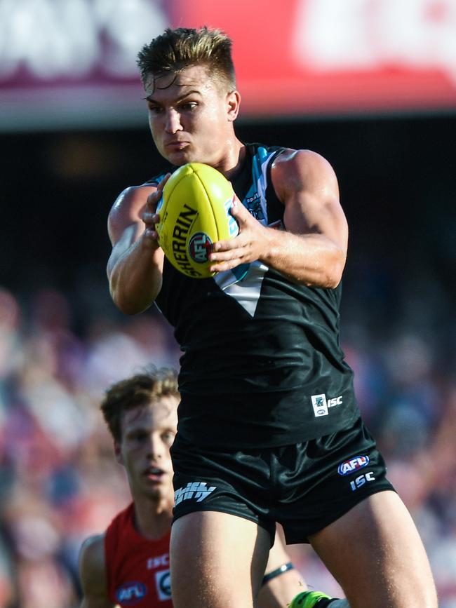 Ollie Wines takes a grab against the Sydney Swans on Sunday. Picture: AAP Image/Brendan Esposito