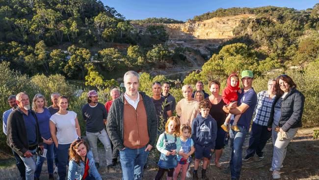 Local residents and members of the group Residents Against White Rock Quarry. Demetrios (Jim) Bastiras (centre) in Horsnell Gully Conservation Park, which looks over the expanding Hanson White Rock Quarry. Picture: Russell Millard