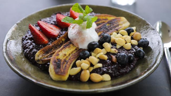 Corner Store Cafe, Toowong, Warm Black Rice and Coconut Pudding. Picture: Mark Cranitch