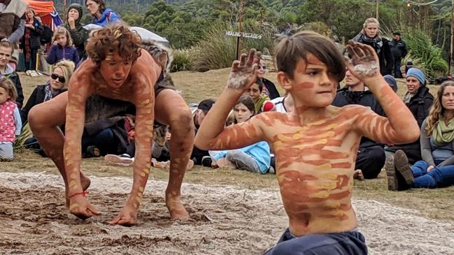 Kangaroo-hunting dance at the opening ceremony, just before the audience joins in for an emu dance. Picture: AMANDA DUCKER