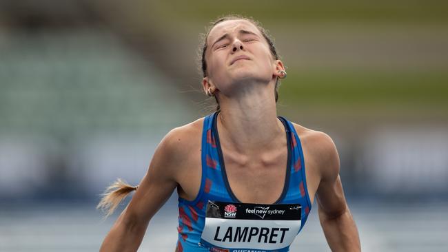 Tammin Lampret from Caringbah winning her hurdles final