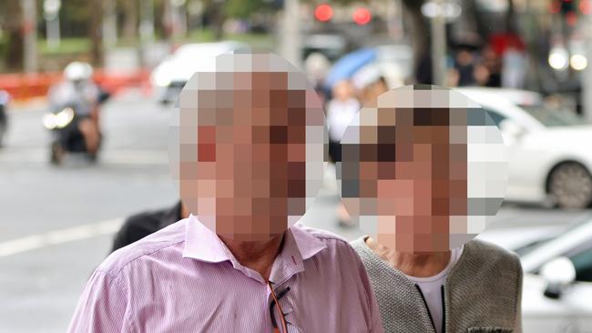 SYDNEY, AUSTRALIA - NewsWire Photos MARCH 22, 2024: *** CANNOT BE IDENTIFIED, SUPPRESSION ORDERS IN PLACE, MUST PIXELATE FACES*** William Tyrrell's foster parents pictured as they arrive at Downing Centre courts, Sydney CBD. William Tyrrell's foster parents have been charged with dummy bidding and assaulting a child who is not William.Picture: NCA NewsWire / Damian Shaw